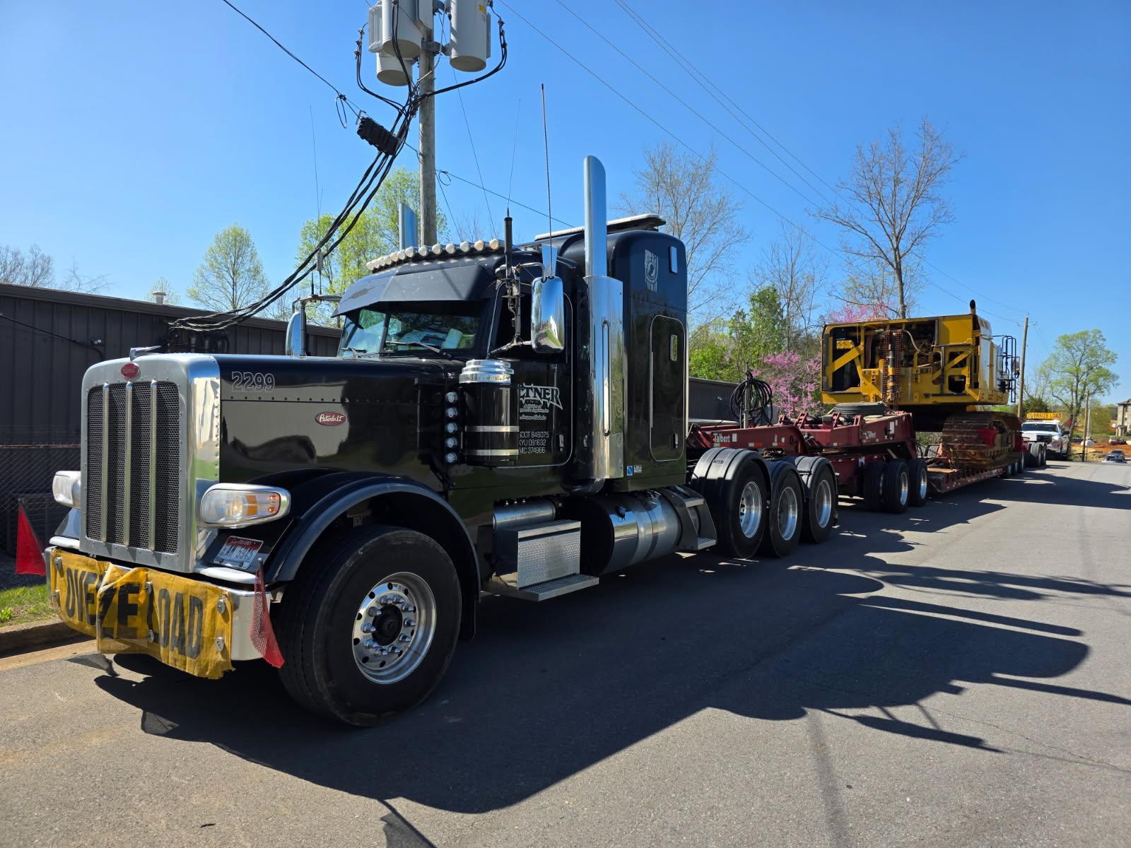 Oversize Load Truck with Oversize Load Banner on Bumper